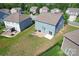 Aerial view of the backyard featuring a patio and fire pit at 3023 Spinner Ct, Denver, NC 28037