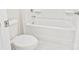 Cozy bathroom featuring a toilet and a bathtub-shower combo, designed for comfort at 3023 Spinner Ct, Denver, NC 28037