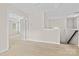 Bonus room with neutral carpet, white trim and access to another room at 3023 Spinner Ct, Denver, NC 28037