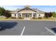 Well-maintained clubhouse with manicured landscaping and ample parking at 3023 Spinner Ct, Denver, NC 28037
