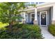Charming front porch with stone accents, well-kept garden, and inviting entrance at 3023 Spinner Ct, Denver, NC 28037