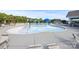 Fun pool area with shallow splash pool, mushroom water feature, and lounge seating at 3023 Spinner Ct, Denver, NC 28037