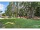 Spacious backyard with lush greenery and a view of the natural surroundings at 2016 Cedar Falls Dr # 7, Waxhaw, NC 28173