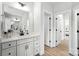 Elegant bathroom with dual sinks, stylish vanities, and access to multiple rooms at 2016 Cedar Falls Dr # 7, Waxhaw, NC 28173