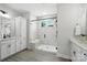 Modern bathroom showcases a glass-enclosed shower and dual vanities with sleek fixtures at 2016 Cedar Falls Dr # 7, Waxhaw, NC 28173