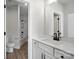 Modern bathroom showcasing a vanity with a mirror and a view of a toilet and shower at 2016 Cedar Falls Dr # 7, Waxhaw, NC 28173