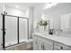 Modern bathroom features a tiled shower with black trim and a white vanity at 2016 Cedar Falls Dr # 7, Waxhaw, NC 28173