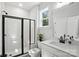 Modern bathroom featuring a glass shower, sleek vanity, and subway tile at 2016 Cedar Falls Dr # 7, Waxhaw, NC 28173