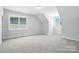 Bright bedroom features neutral walls, plush carpeting and two windows offering natural light at 2016 Cedar Falls Dr # 7, Waxhaw, NC 28173