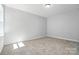 Bright and spacious bedroom with neutral carpet and natural light at 2016 Cedar Falls Dr # 7, Waxhaw, NC 28173