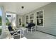 Charming covered patio with comfortable seating and a view of the well-maintained backyard at 2016 Cedar Falls Dr # 7, Waxhaw, NC 28173