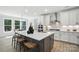 Modern kitchen with an island, stainless steel appliances, white countertops, and stylish seating at 2016 Cedar Falls Dr # 7, Waxhaw, NC 28173