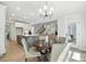 Open concept kitchen, dining, and living area with stylish decor at 2016 Cedar Falls Dr # 7, Waxhaw, NC 28173