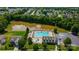 Aerial view of community pool with waterpark and beautiful lake at 14447 Waterlyn Dr, Charlotte, NC 28278