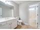 Neutral bathroom with a double sink vanity, toilet, and shower-tub combination at 14447 Waterlyn Dr, Charlotte, NC 28278