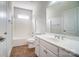 A bathroom featuring a white vanity, toilet, shower, and a neutral color scheme at 14447 Waterlyn Dr, Charlotte, NC 28278