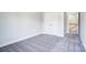 Carpeted bedroom with a double-door closet at 14447 Waterlyn Dr, Charlotte, NC 28278