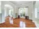 Open living space with hardwood floors and large windows at 14447 Waterlyn Dr, Charlotte, NC 28278