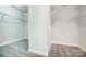 A walk-in closet offers plenty of storage space with built-in shelving at 14447 Waterlyn Dr, Charlotte, NC 28278