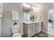 Bright bathroom with double vanity, sleek fixtures, and contemporary finishes at 130 Summerhill Dr # 16, Mooresville, NC 28115