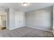 The bedroom features carpet and a closet with classic double doors at 130 Summerhill Dr # 16, Mooresville, NC 28115