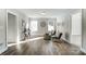 Bright living room with wood floors, windows, and tastefully chosen decor at 130 Summerhill Dr # 16, Mooresville, NC 28115