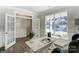 Bright and airy home office featuring large windows and an elegant desk creating an inspiring workspace at 130 Summerhill Dr # 16, Mooresville, NC 28115