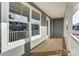 Inviting porch with gray siding, white trim, and a clear view from the large window at 130 Summerhill Dr # 16, Mooresville, NC 28115