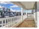 Inviting porch featuring wood decking and views of the charming neighborhood at 130 Summerhill Dr # 16, Mooresville, NC 28115