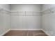 Spacious walk-in closet with shelving, offering ample storage solutions at 130 Summerhill Dr # 16, Mooresville, NC 28115