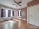 Hardwood floor bedroom with two windows at 5237 Nc Highway 90 E Hwy, Hiddenite, NC 28636