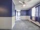 Blue bedroom with hardwood floors and wainscoting at 5237 Nc Highway 90 E Hwy, Hiddenite, NC 28636