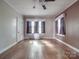 Hardwood floor bedroom with two windows at 5237 Nc Highway 90 E Hwy, Hiddenite, NC 28636