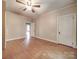 Bedroom with hardwood floors and a door at 5237 Nc Highway 90 E Hwy, Hiddenite, NC 28636