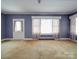 Living area with bay window and neutral walls at 5237 Nc Highway 90 E Hwy, Hiddenite, NC 28636