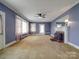Living room with fireplace and built-in shelving at 5237 Nc Highway 90 E Hwy, Hiddenite, NC 28636