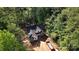 New house under construction in a wooded area, seen from above at 248 Pioneer Dr # 990, Mount Gilead, NC 27306