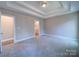 Main bedroom with gray carpet and access to bathroom at 248 Pioneer Dr # 990, Mount Gilead, NC 27306
