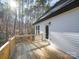 Wooden deck with view of trees and pond at 248 Pioneer Dr # 990, Mount Gilead, NC 27306
