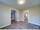 Open dining area with kitchen and staircase views at 248 Pioneer Dr # 990, Mount Gilead, NC 27306