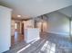 Open concept kitchen with breakfast bar and high ceilings at 248 Pioneer Dr # 990, Mount Gilead, NC 27306