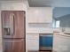 Chic kitchen with stainless steel appliances and rose gold fridge at 248 Pioneer Dr # 990, Mount Gilead, NC 27306