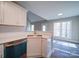 Kitchen with corner sink and view into dining area at 248 Pioneer Dr # 990, Mount Gilead, NC 27306