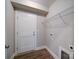 Laundry room with built-in shelving and vinyl flooring at 248 Pioneer Dr # 990, Mount Gilead, NC 27306