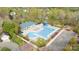 Aerial view of a community pool, complete with a large pool and sundeck, perfect for summer enjoyment at 17615 Trolley Crossing Way, Cornelius, NC 28031