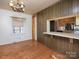 Charming dining room with wood floors and unique wall accents at 553 Georgia Ave, Statesville, NC 28677