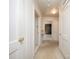 A hallway with multiple doors and carpeted floors offering access to other rooms in the house at 553 Georgia Ave, Statesville, NC 28677