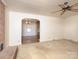Spacious living room featuring an archway and neutral carpet at 553 Georgia Ave, Statesville, NC 28677