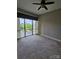 Empty bedroom featuring a carpeted floor, a large window and city views at 701 Royal Ct # 309, Charlotte, NC 28202