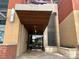 Modern building entrance with water feature and covered entryway at 701 Royal Ct # 309, Charlotte, NC 28202